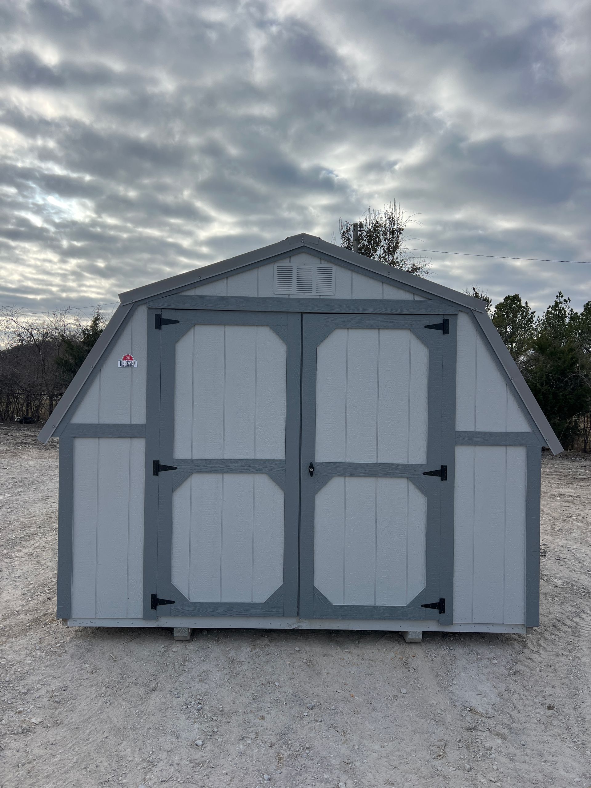 Explore our Derksen 10x12 Standard Barn with sleek Light Gray